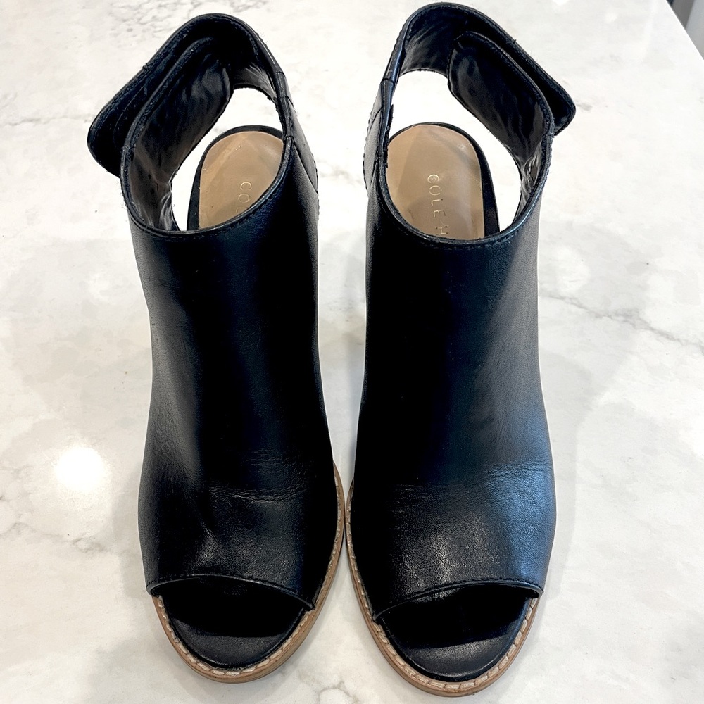Cole Haan black leather booties! Worn once.  black leather. 8B wood look 3” heel
